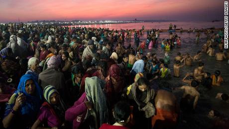 Hindus take a dip in Prayagraj, where Ganges, Yamuna and Sarasvati rivers meet.