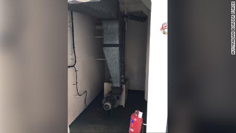 A dog unit saw the man hiding in an air conditioning unit on the cargo ship.