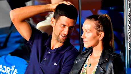 Serbian tennis player Novak Djokovic (L) talks with his wife Jelena on June 14, 2020 during a match played at the Novak Djokovic Balkans charity tennis tournament in Belgrade.