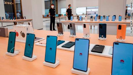 Smartphones are on display at a Huawei store prior to its opening in Shanghai this month. 
