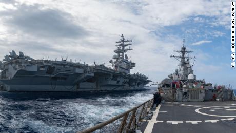 Guided missile destroyer USS Barry is working with the aircraft carrier USS Ronald Reagan in the Philippine Sea on May 30.