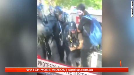Australian journalists were shown under the attack of the police.