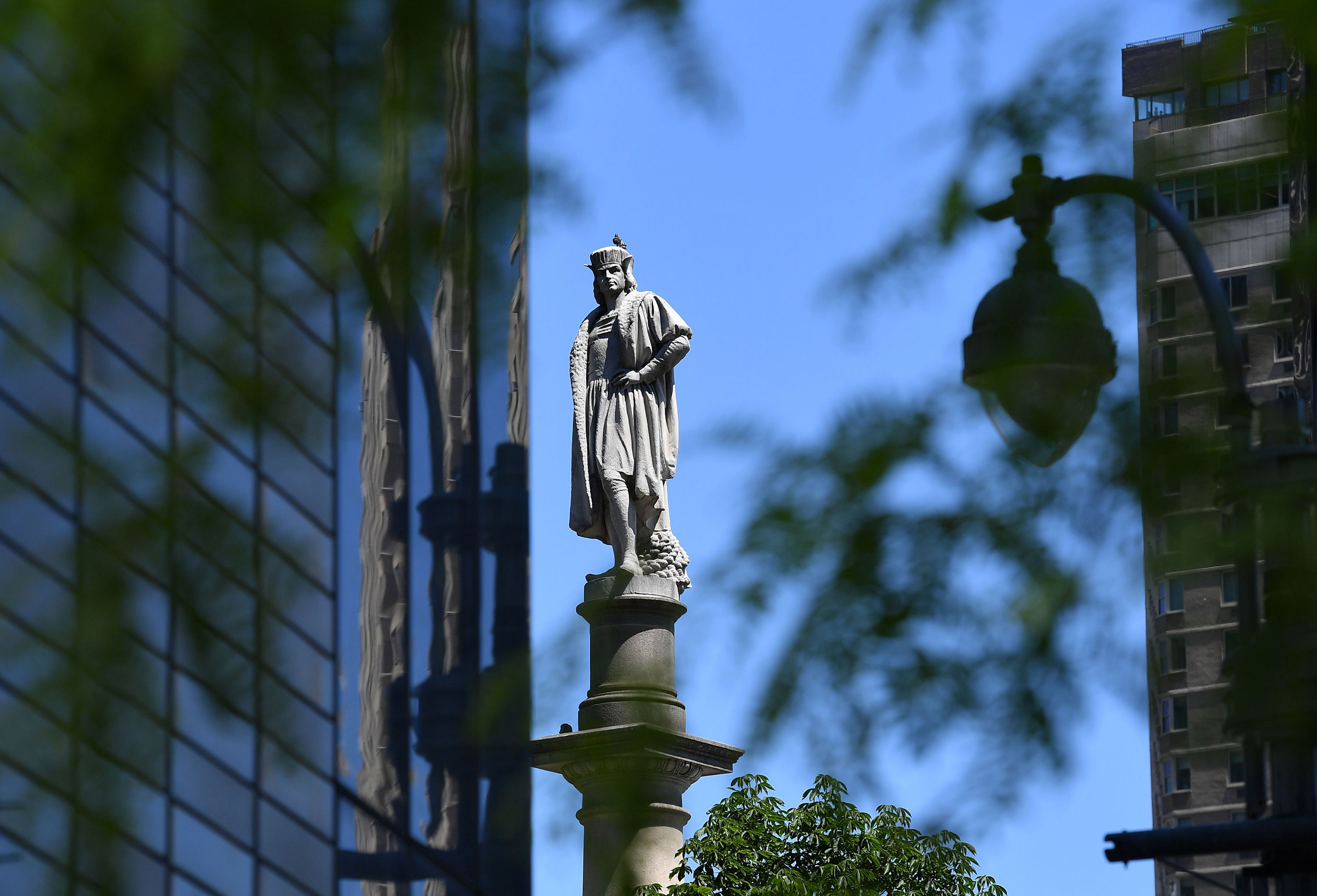 Christopher Columbus statue appears in Columbus Circle near Central Park in New York on June 12.
