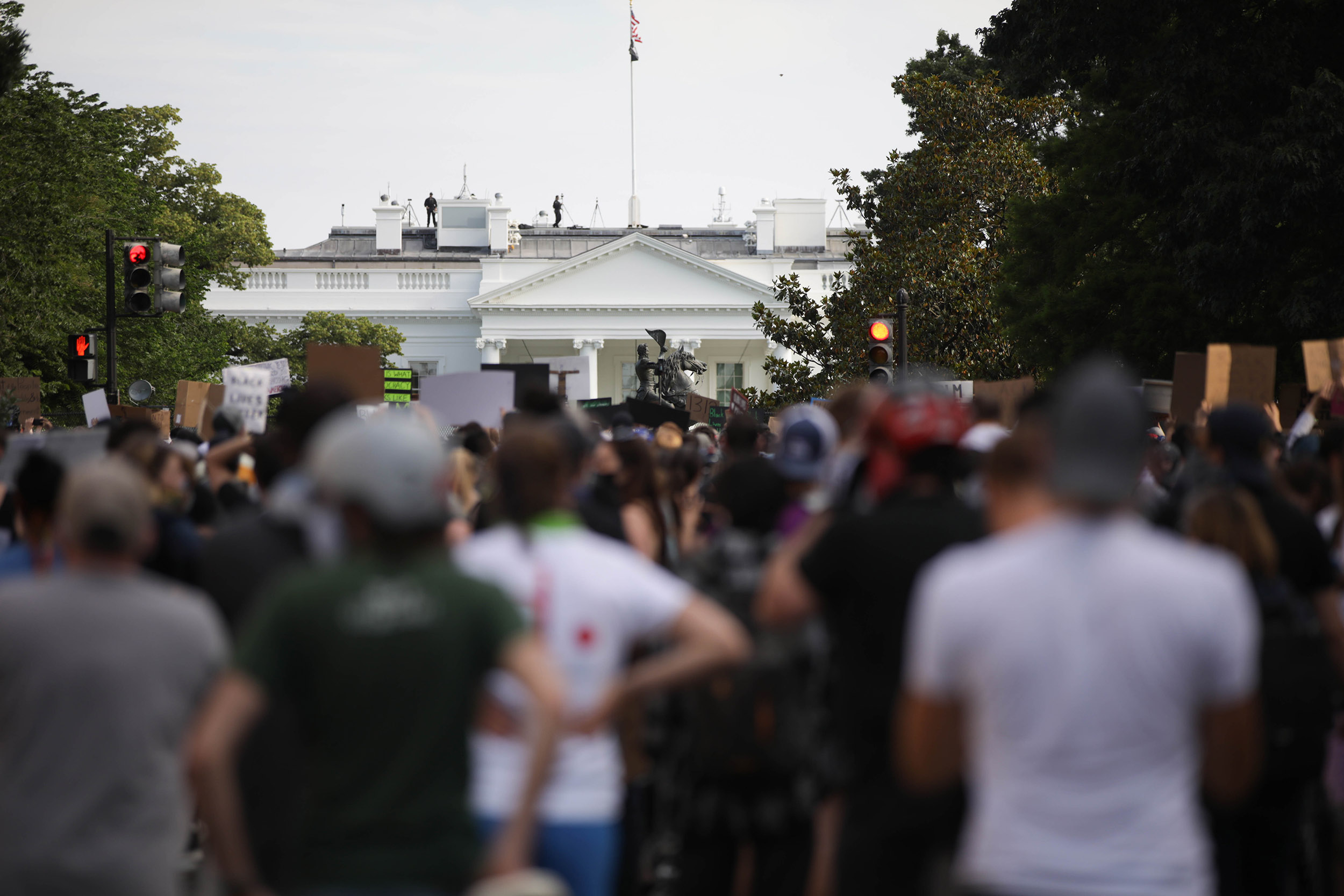 Protesters gather in front of the White House upon the death of an unarmed black man, who died after being attacked by a white police officer in Minneapolis on June 2. 