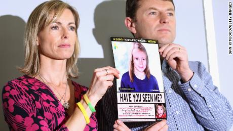Kate and Gerry McCann have an age-old police image of Madeleine at a news conference in London on the 5th anniversary of her disappearance in May 2012.