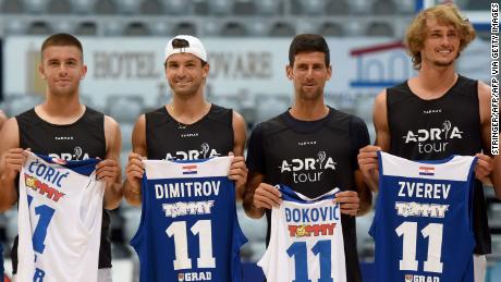 Borna Coric, Grigor Dimitrov, Novak Djokovic and Alexander Zverev (left to right) pose for a group shot before an exhibition basketball game in Zadar, Croatia. 
