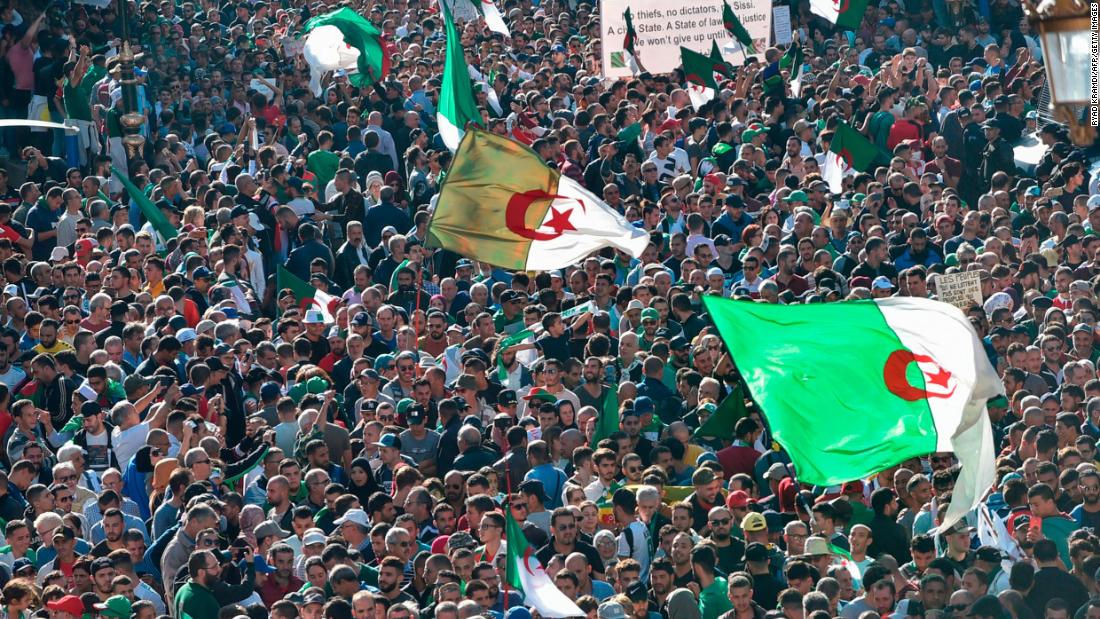 Algerians take part in an anti-government demonstration in Algiers on November 1, 2019, timed to coincide with official celebrations of the anniversary of the war that won Algeria's independence from France.