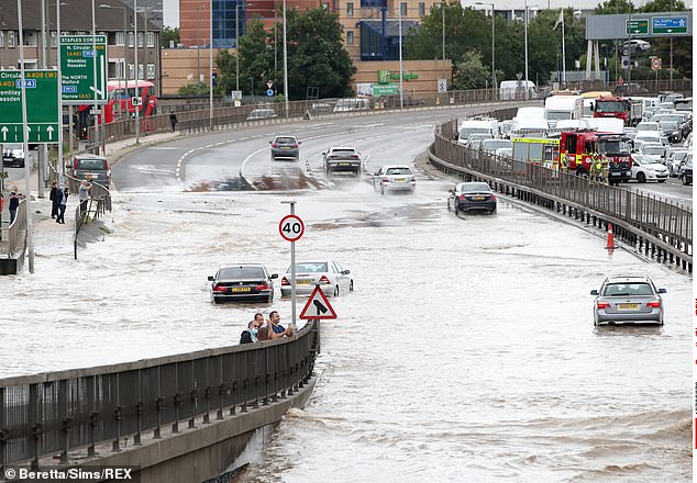 The A406 carriageway on the North Circular Road was completely flooded following a burst water main on Monday, leaving many cars damaged and stranded