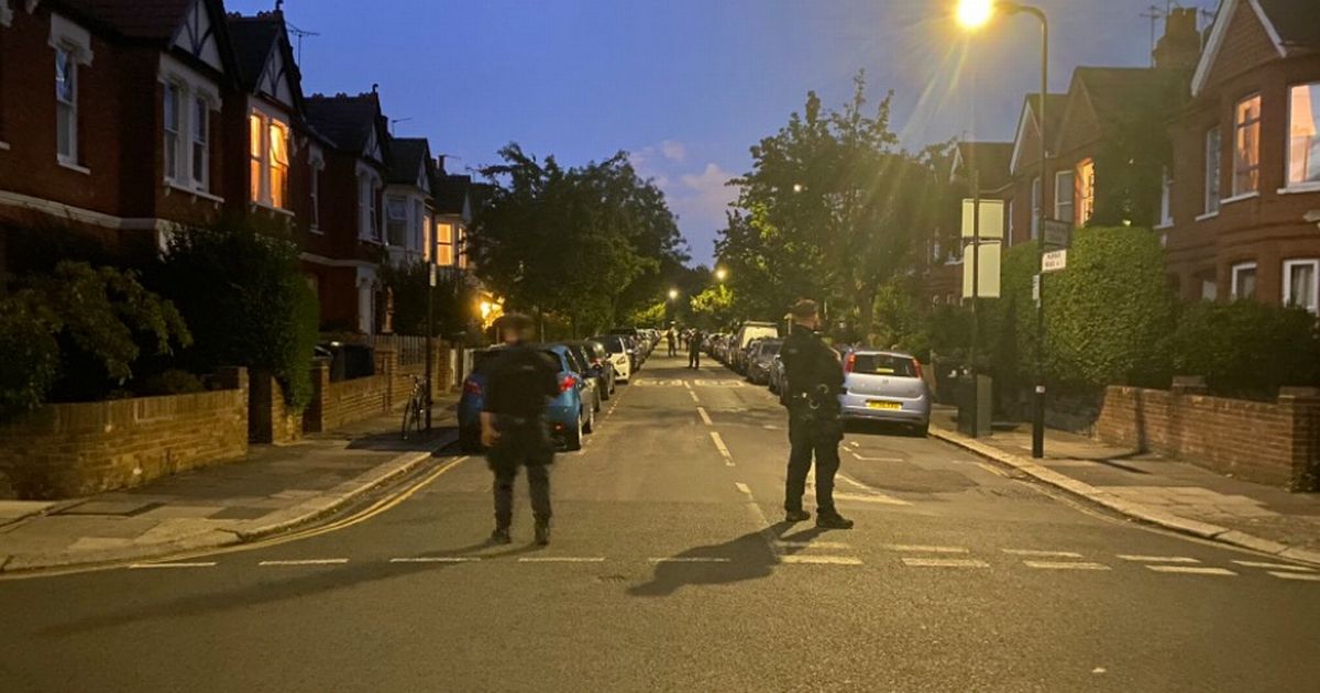 'Loud bangs' heard in Ealing as armed police seal off road and helicopter circles area