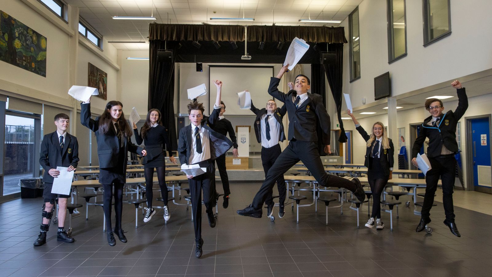 Handout photo issued by Jeff Holmes of pupils celebrating their exam results at Linwood High in Renfrewshire. Pupils across Scotland are finding out their Scottish Qualifications Authority (SQA) grades on Tuesday as results were published amid a row over how they have been reached during lockdown.