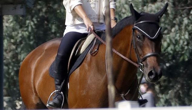 Saddle Up: Olivia Wild enjoyed thousands of horseback riding north of Los Angeles on Sunday, looking great at the top in black Jodpur and riding boot designs