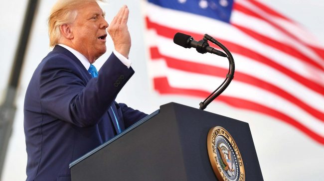 US president Donald Trump addresses a crowd on Thursday, amid accusations that he called war dead 'losers'
