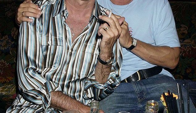 George Michael's ex-boyfriend Kenny Goss is suing the singer's family for trying to get £ 15,000 a month from the late star's estate.  Pictured: The then couple in 2002